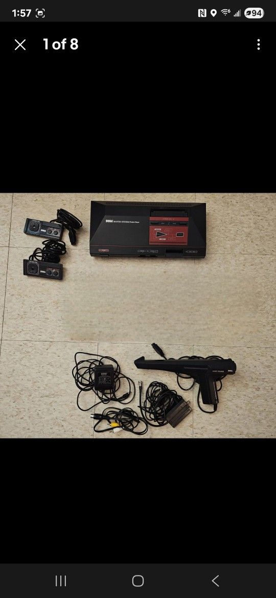 Sega Master System Console, 2 Games, 2 Controllers, 1 Light Phaser Gun.