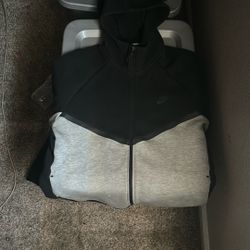 large grey and black nike tech sweater!