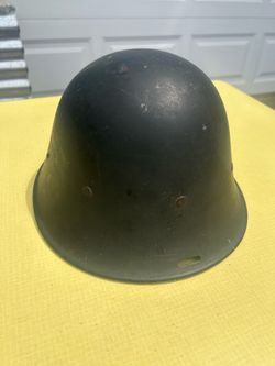 Antique European Army helmet, Probably post World War II. Eastern European is my guess. Does not appear to be a reproduction.The leather lining is in