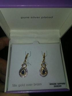 18 k over earring real stone