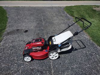 Toro rear bagger self-propelled lawn mower electric start new battery and charger runs great
