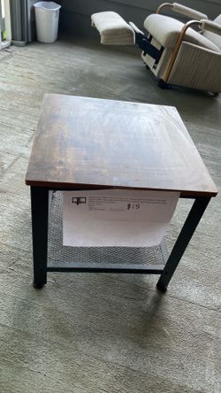 Small rustic metal and wood table