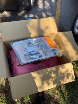 2009-2018 Dodge Ram 1500 factory Quad style halogen headlights