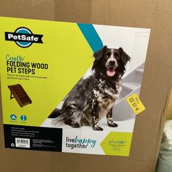 Brand new folding wood pet steps. never opened !!