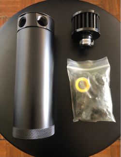 brand new universal 2 port 750ml baffled oil catch can reservoir tank with breather filter for cars and trucks.