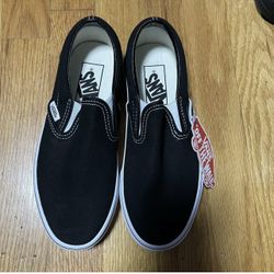 Vans Mens Size3.5 or Womens 5 Black Pair Of Slip On With White Trimming. New 