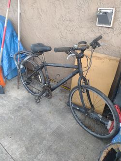 Marin 21-ish speed mountain bike with surfboard rack