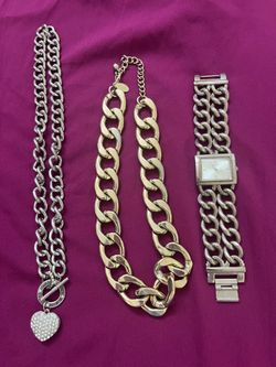 Guess women’s watch and 2 necklaces