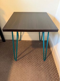 Two bedside midcentury modern tables