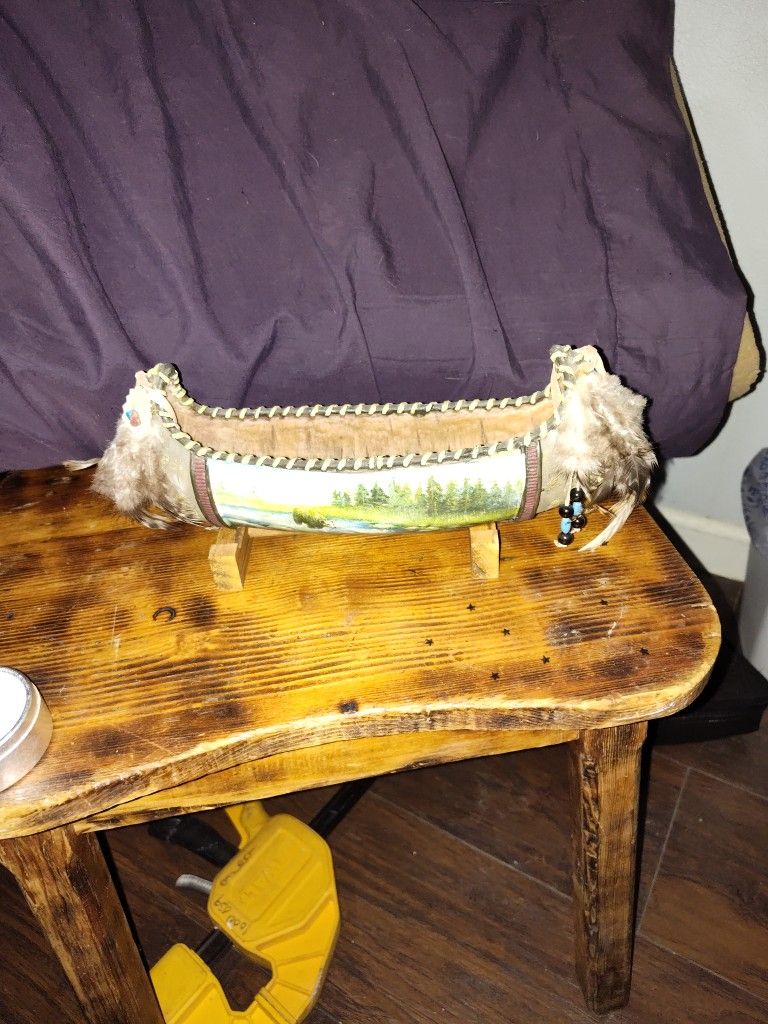 Native Canoe With Paddles