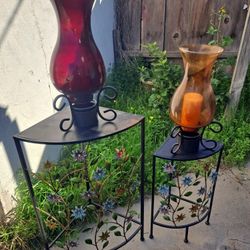 two stands with two vases