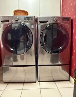 LG Front-Load Washer & Gas Dryer Set w/ Pedestals - Graphite Steel