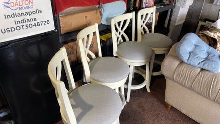 6 revolving barstools