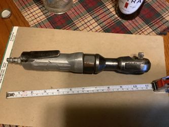This is a pneumatic air ratchet wrench, likely a 3/8" drive model, that operates on compressed air.The tool resembles a model 20 or
