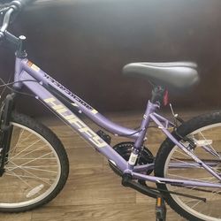 Purple HUFFY bike 
