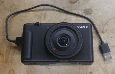 SONY ZV-1F 20.1MP 4K Video Vlogging Digital Camera  W CORD AND MEMORY CARD 128GB. USED. TESTED. IN A GOOD WORKING ORDER. F(contact info removed)7.