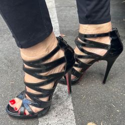 Black patent Louboutins and Roberto Cavalli High heels 