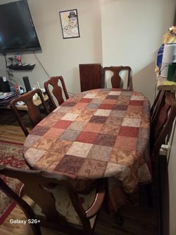 Adam Ethan.
Dining room table