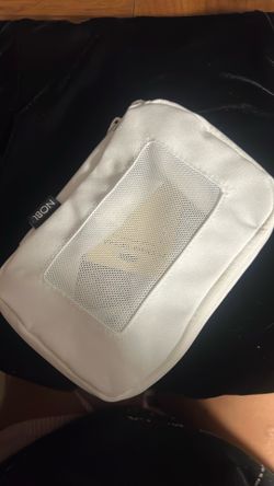 NOBL  bag with earring backs, and necklace replacements