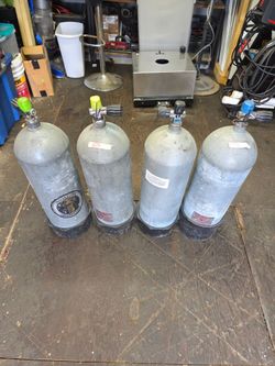 4 steel Scuba tanks