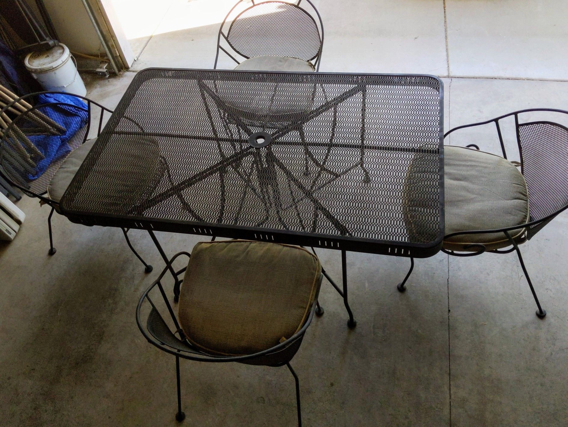 Heavy duty metal patio table and 4 chairs with cushions