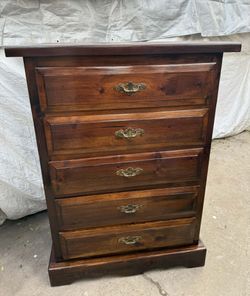 Tall dresser real pine wood color brown has been refurbished is in great condition drawers are clean are working