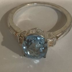 Woman’s Genuine Blue Topaz Gemstone Ring Set In Sterling Silver