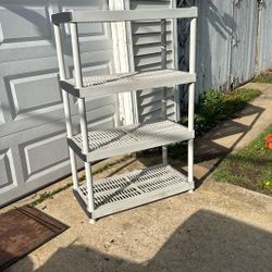 Plastic Shelving Unit 55” Tall by 3’ Long by 18” Wide Approximately.