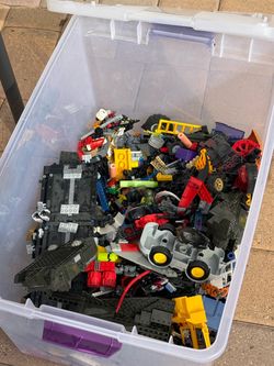 Bucket of Lego mega blocks and misc