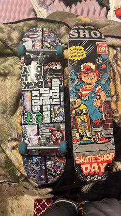 2 skateboards  one set up not used that much gna need sum grip tape for the GTA one and the others brand new