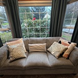 Modern three-seater sofa, light grey textured upholstery:l