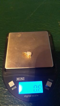 Opal and Diamond 14k gold pendant