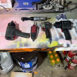 Pneumatic wrenches