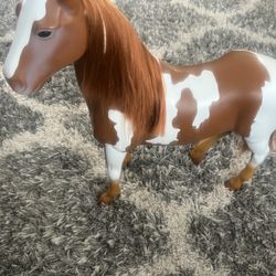 large toy spotted  horse 