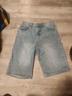 Light blue jorts wings on back gems size 7