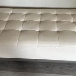 Faux leather ottoman