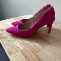 Pink suede pumps