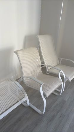 2 chairs and one piece to put your feet