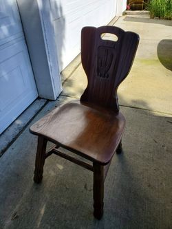 Antique hand carved, hand made, solid wood chair