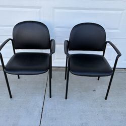 2 Comfort Black Vinyl Stackable Steel Side Reception Chairs with Arms