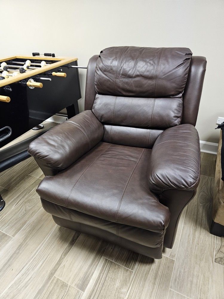 Brown leather power recliner. 