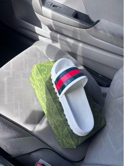White platform Gucci slides