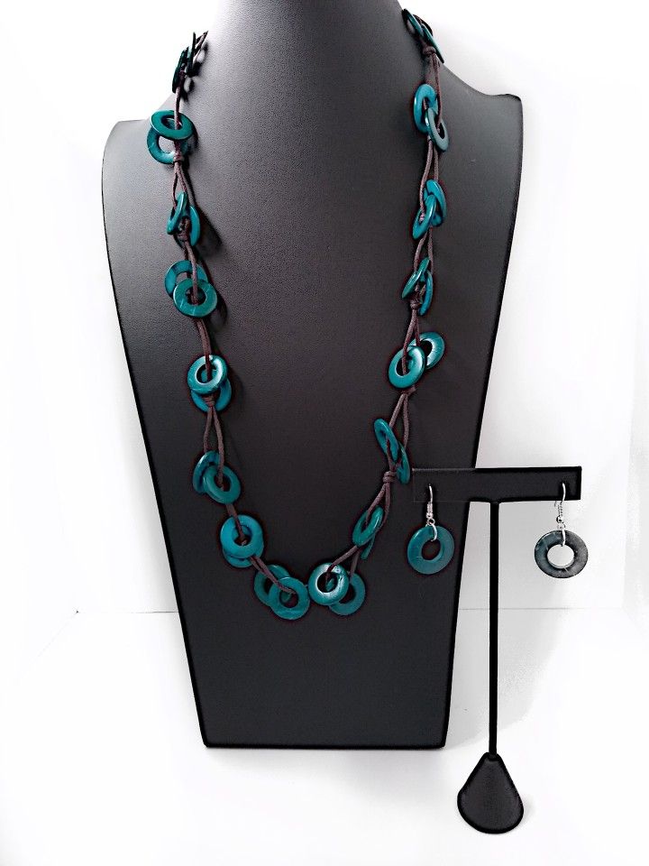 Green Circle And Leather Necklace With Matching Earrings. Also A Tooth Necklace