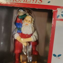 Vtg Westmar Christmas Moments Santa and Elf Sawing Log Wood Collectible
Ornament Box. New, in the box. Never been used. Never taken out of the
box.