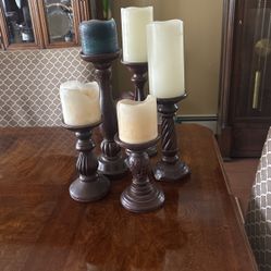Five Pillar Candle Holders. Dark brown.