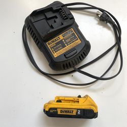 Dewalt 20v  battery 2amp and charger in Good Working Condition $40 Cash In Ontario 91762. 20 volt 
