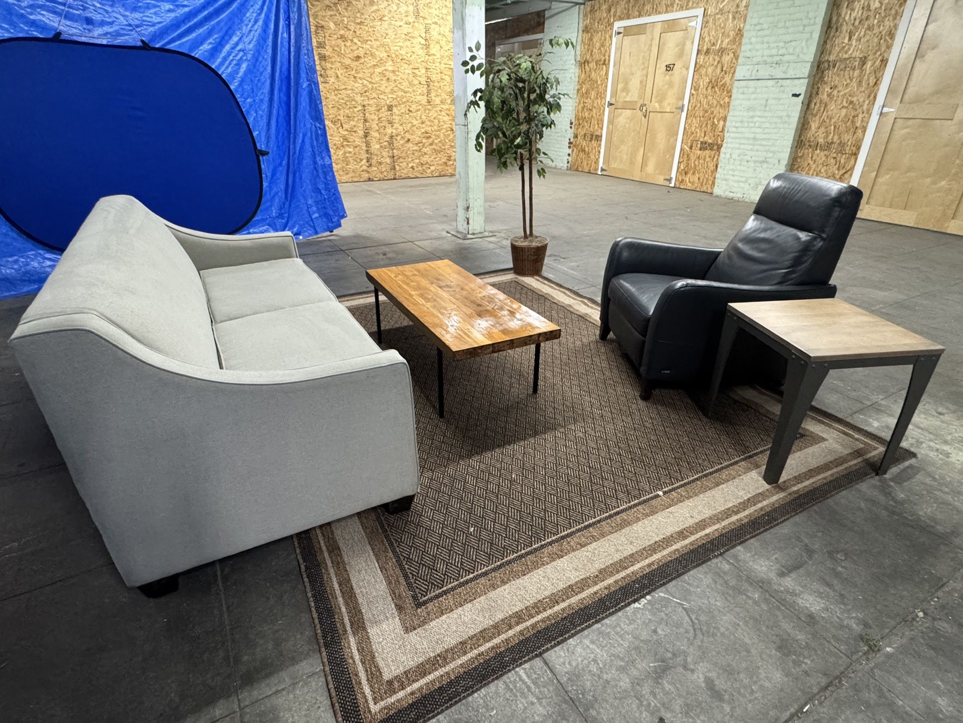 Mid Century Modern Sofa, Natuzzi Italian Leather Recliner, and Two Solid Wood Tables