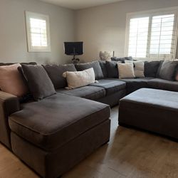 Grey Sectional With Storage Ottoman