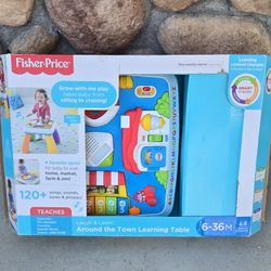 Fisher - Price: Around The Town Learning Table.