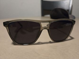 Unisex Neven Eyewear (Rip Tide) Frame Transparent Gray, Lens Color Polarized Black. Only worn a handful of times look brand new.